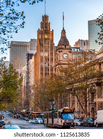 MELBOURNE, VICTORIA/AUSTRALIA JUNE 7: A number 48 Melbourne tram is making its way along Collins Street in front of the Melbourne Town Hall on June 7, 2018
