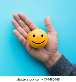 Mele Hand Holding Yellow Emoticon Ball Stock Photo 774495448 | Shutterstock