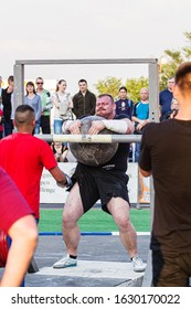 Melitopol, Ukraine, Date May 27, 2017, Strongman Throws A Heavy Ball Of Stone Through The Crossbar