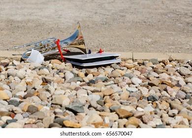 A Mellophone Getting Some Sun On The Rocks