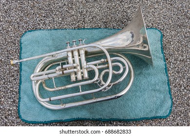 A Mellophone Taking A Break On A Towel At Band Camp