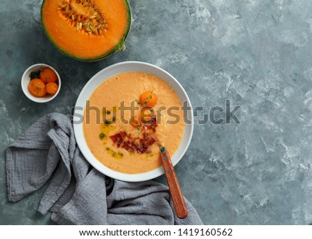 melon cold soup, with jamon, typical spanish                          