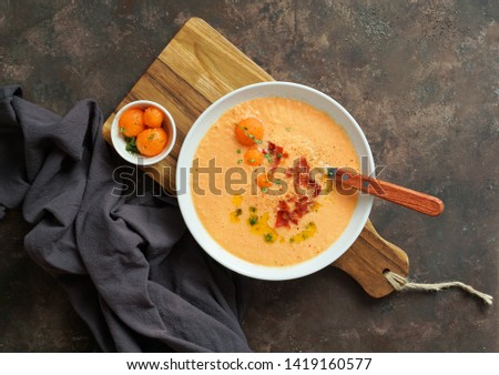 melon cold soup, with jamon, typical spanish                          