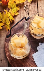 Melon. Pieces Of Fresh Melon For Making Fruit Dessert In Glass On An Old Wooden Background. Mock Up. Top View.