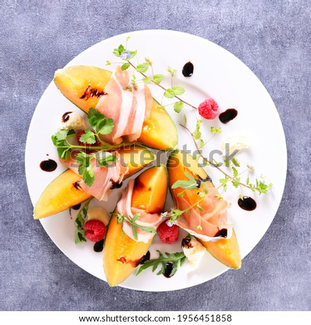 Similar – Image, Stock Photo Melon slices on plate