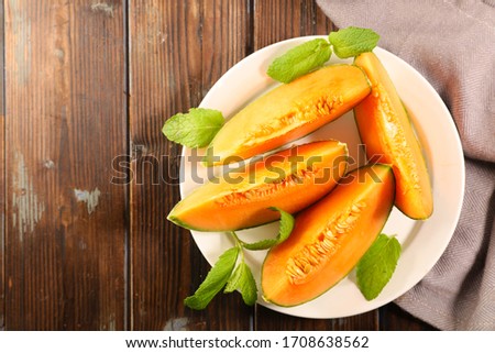Similar – Image, Stock Photo Melon slices on plate