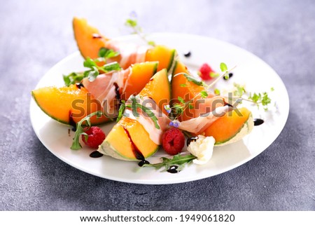 Similar – Image, Stock Photo Melon slices on plate