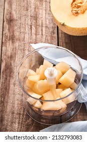 Melon. Sliced Melon For Making Fruit Dessert In Blender For Proper Nutrition On An Old Wooden Background. Mock Up. Top View.