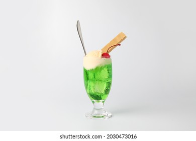 melon soda float with vanilla ice cream drink isolated on white background