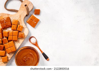 Melt Caramel Sauce In Bowl Awith Toffee Candies, Top View