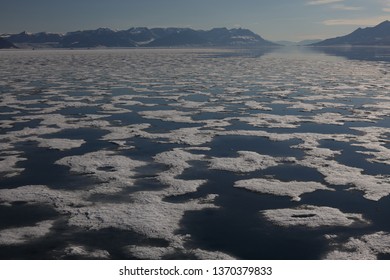 Melt Water Ponds On Thin Sea Ice In A Fjord In Greenland