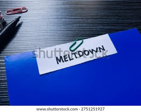 Meltdown writting on table background. 