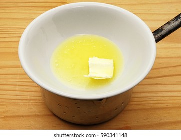 Melted butter in a double boiler.