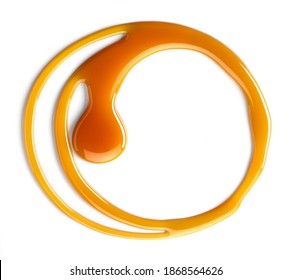 Melted Caramel Sauce Isolated On White Background, Top View