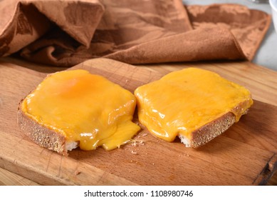 Melted Cheddar Cheese On Top Of Ciabatta Bread Toasts