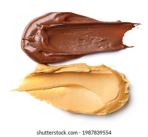 melted chocolate hazelnut cream and peanut butter isolated on white background, top view - Shutterstock ID 1987839554
