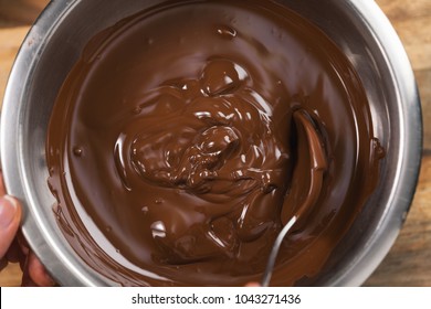 Melting Dark Chocolate In Steel Bowl