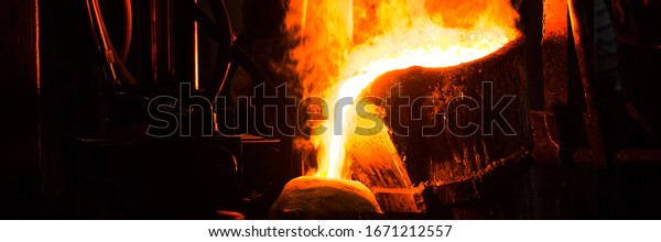 Melting furnace and\
factory equipment for cast iron and steel. The molten liquid metal\
is poured into the\
mold.