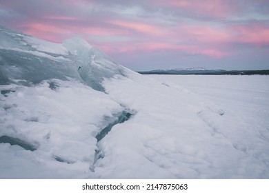 The Melting Ice Floes Stack On The Coast Of Lake Storsjö. Signs Of Global Warming? Sweden Jämtland (Lapland). 