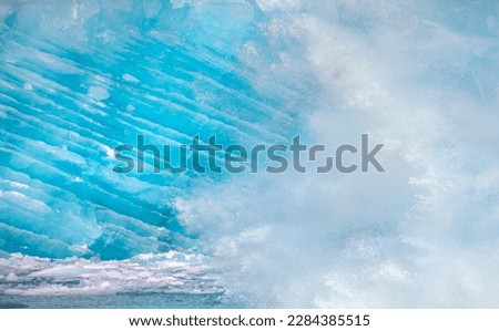 Melting icebergs by the coast of Greenland with strong sea wave - Melting of a iceberg and pouring water into the sea - Greenland  