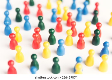 Melting pot concept with diverse game figurines as a symbol of different people, vintage style - Shutterstock ID 236459074