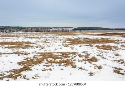 The melting of the snow on the fields in early spring - Powered by Shutterstock