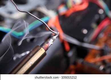 Melting Solder Wire On Soldering Iron Tip