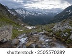 Meltwater creek at Sustenpass, Uri, Switzerland in morning light