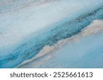 Meltwater flowing down the Athabasca Glacier in the Columbia Icefield, Jasper National Park, Alberta, Canada