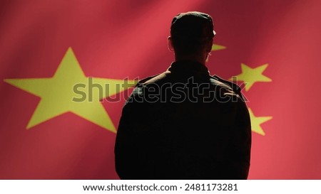 Member of chinese army doing saluting hand gesture towards China flag in command center, showing respect. Military unit in uniform serving Chinese Communist Party, doing honoring gesturing, camera A