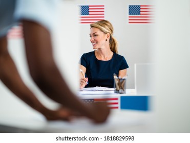 Member Of Electoral Commission In Polling Place, Usa Elections.