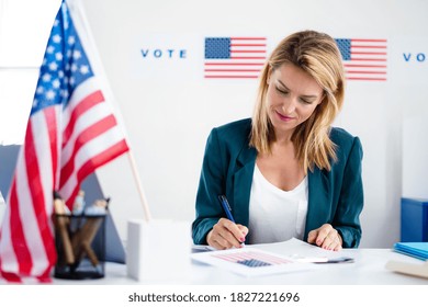 Member Of Electoral Commission In Polling Place, Usa Elections.