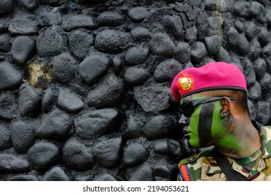 A Member Of The Marines Demonstrates How To Observe The Enemy In A Dangerous Terrain (surabaya, 4 December 2016)