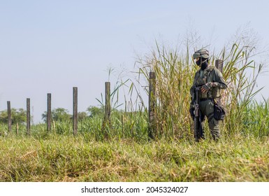 
Member Of The National Army Of Colombia, Guarding The PanaAmericana Highway In Cauca.