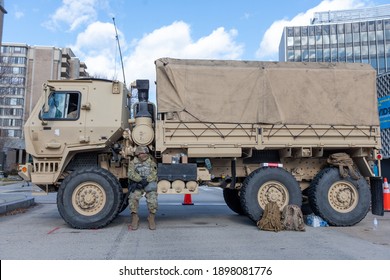 A Member Of The National Guard Sits On A Truck Near The Lincoln Memorial On January 19, 2021 In Washington D.C. 