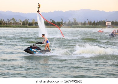 Members Of The Chinese Water Skiing Team Perform Water Tricks And Rowing At The Pool Scene In Kunming, Capital Of Southwest China's Xi 'an, Aug. 14, 2019.