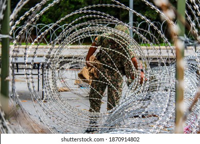 Members Of Malaysian Armed Forces Are Open The Barbed Wire Following Enhanced Movement Control Order In Nilai, Negeri Sembilan, Malaysia On December 1, 2020