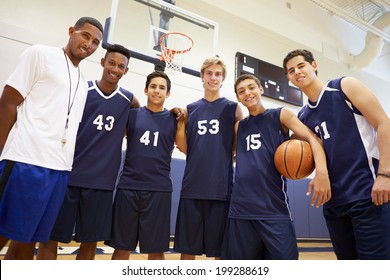 Members Of Male High School Basketball Team With Coach - Powered by Shutterstock