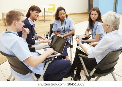 Members Of Medical Staff In Meeting Together
