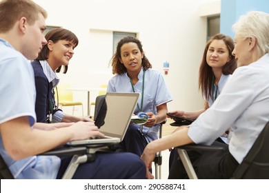 Members Of Medical Staff In Meeting Together