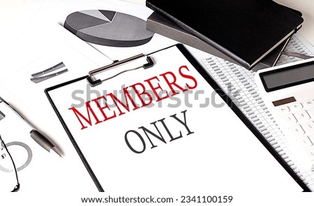 MEMBERS ONLY text on a paper clipboard with chart and notebook on withe background