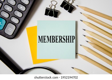 Membership Text Is Written On Yellow Sticker And White Background Near Office Supplies. Word