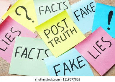 Memo Stick With Words Post-truth And Lies, Fakes And Facts.