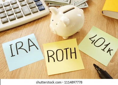 Memo sticks with words IRA 401k ROTH. Retirement plans.