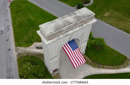 Memorial Arch In Huntington, WV With American Flag. 