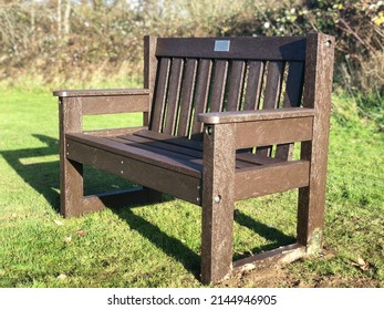 Memorial Bench On Muddy Field