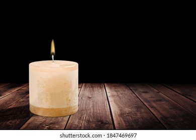 Memorial Burning Candle On Wooden Background