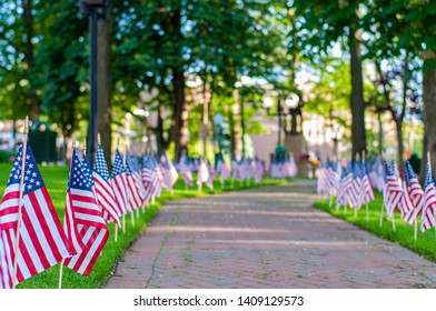 Memorial Day Tribute. American Flags Spread On Lawn Of Public Park As Part Of Memorial Day Celebration. 