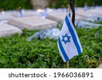 Memorial flag with Yizkor (In memory) word on a soldiers grave on Memorial Day for the Fallen Soldiers of Israel and Victims of Terrorism.