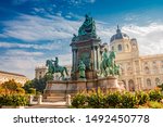 Memorial monument of empress Maria Theresa, flowers and direct light in Vienna, Austria